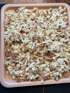 tofu, mushrooms and onion on air fryer tray for air fryer cheesy vegan crab bites