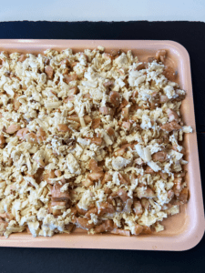 shredded tofu, mushrooms and onion on an air fryer tray