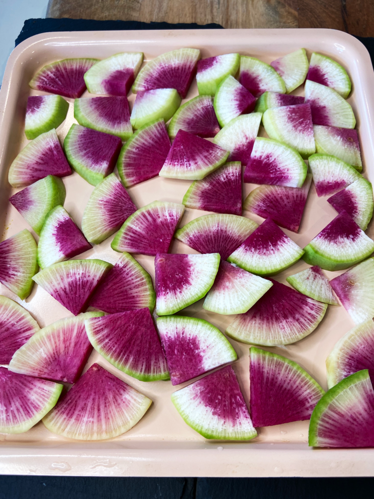 watermelon radish on a tray