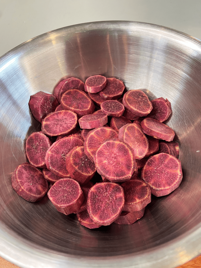 Sliced sweet potatoes for breakfast air fryer purple potatoes