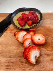 sliced strawberries and raspberries