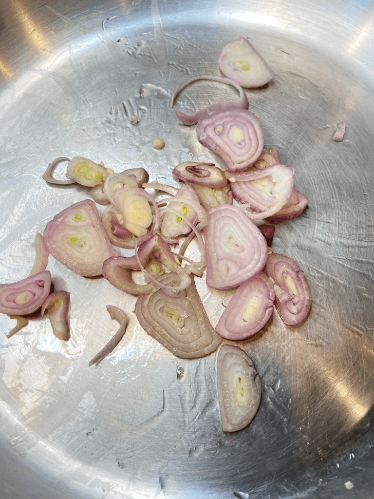 shallots cooking in skillet