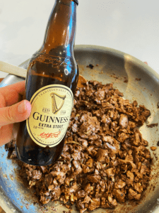 adding Guinness beer to beyond steak tips