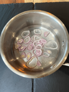 ingredients for pickled shallots in pan