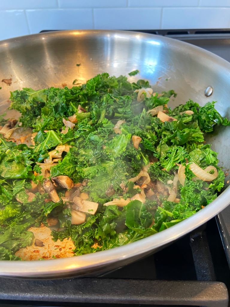 cooking kale and veggies for just egg quiche kale mushroom