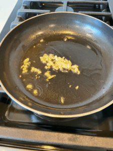 garlic cooking in pan