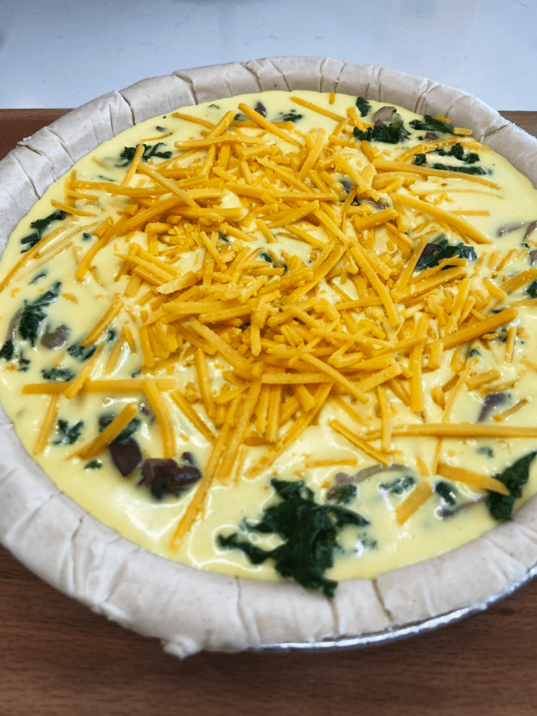  just egg vegan quiche  with kale and  mushroom before baking