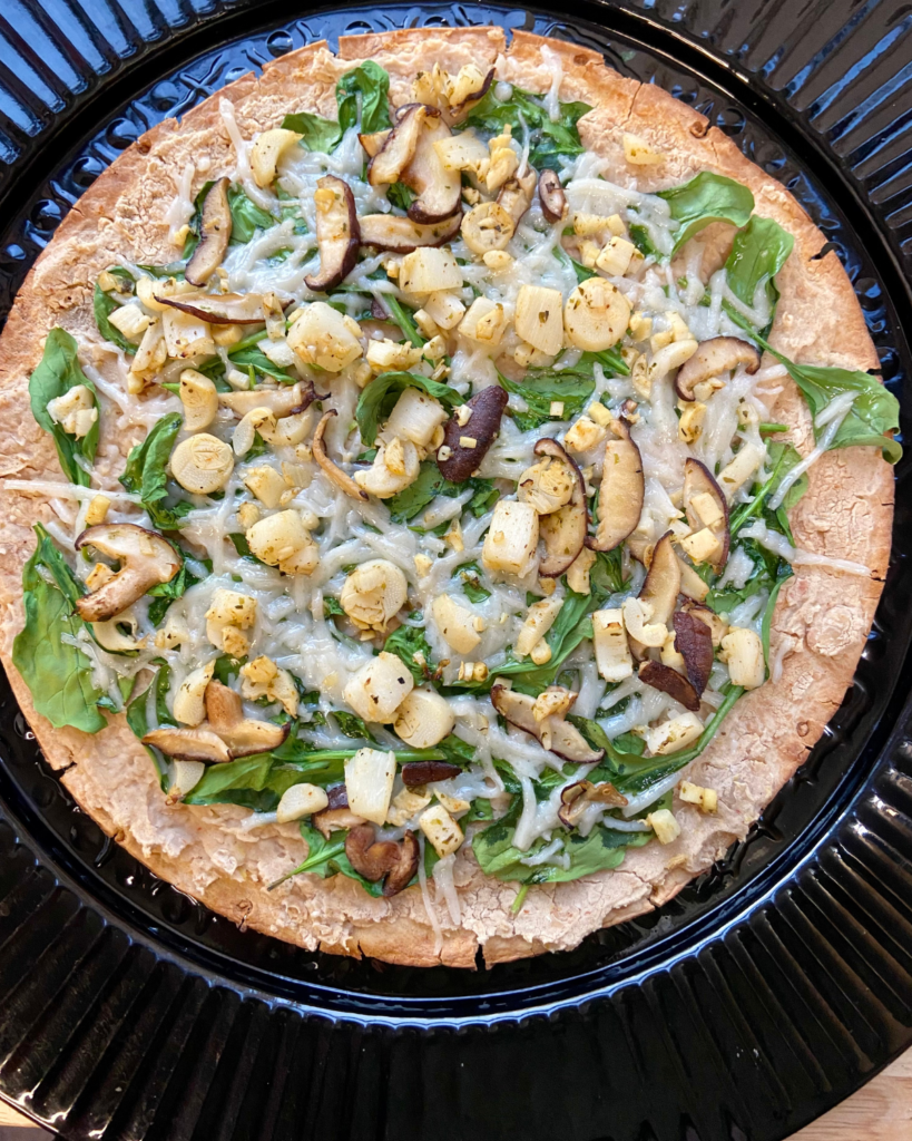 vegan seafood pizza using vegan mozzarella cheese