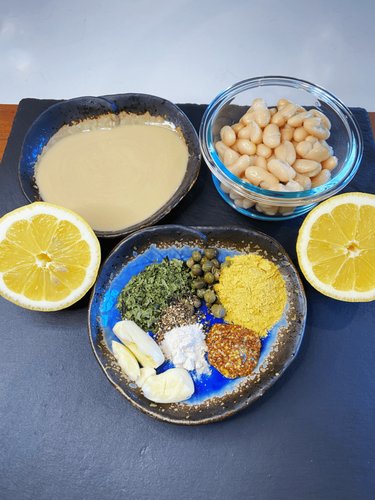 ingredients for creamy Tahini Caesar dressing 