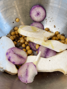 mushrooms, chickpeas, radish, and capers in a bowl