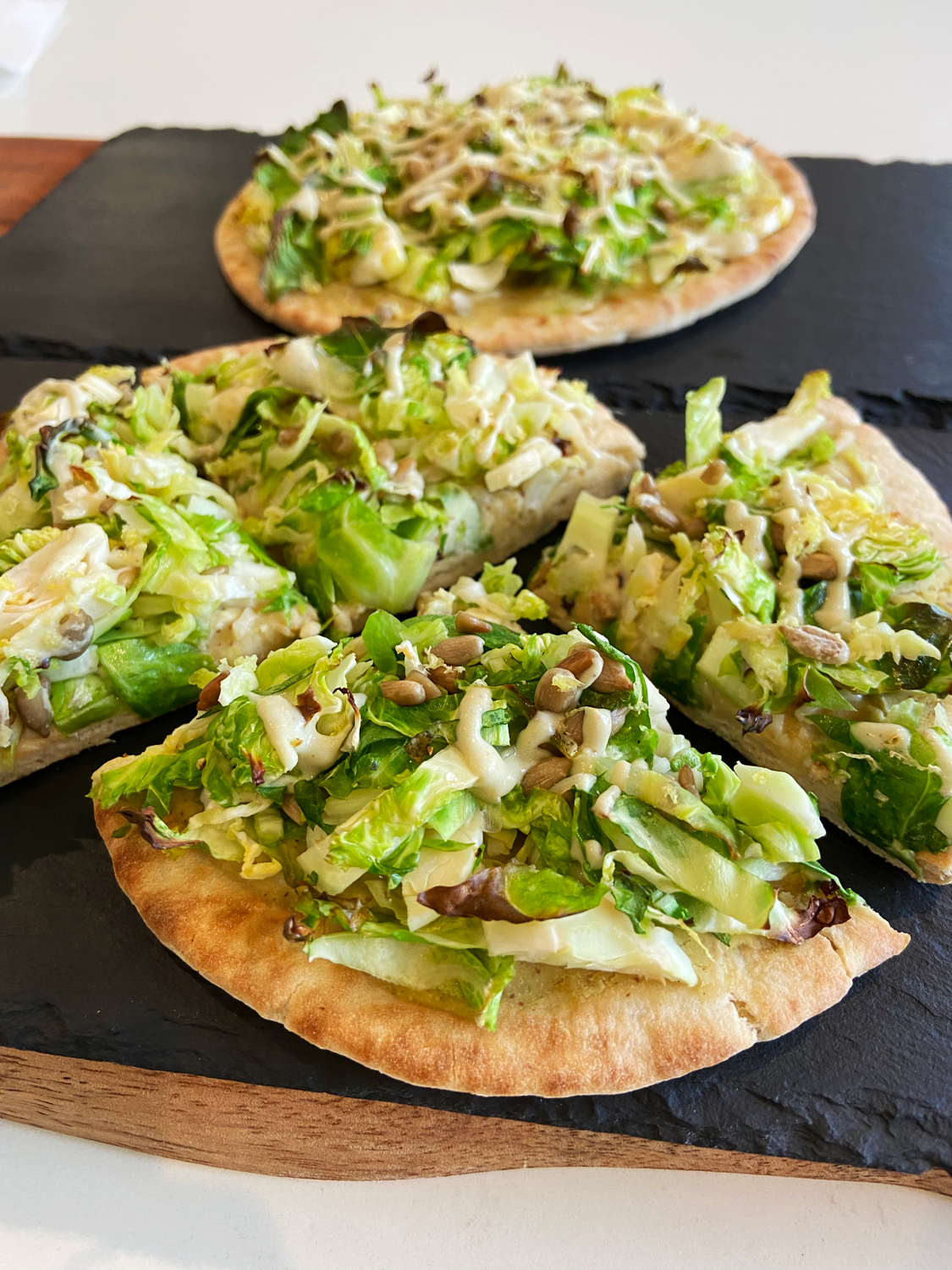 Brussels sprout caesar pita pizza (vegan nut-free caesar)