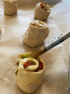 adding oil to Bloody Mary rose muffins