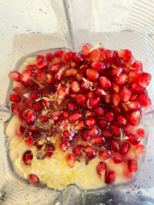 ingredients for tahini pomegranate dressing in blender